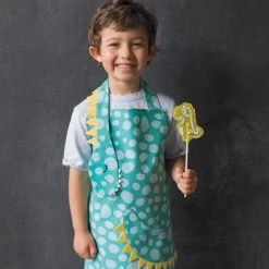 NOW DESIGNS KIDS DAYDREAM DINO APRON LINENS